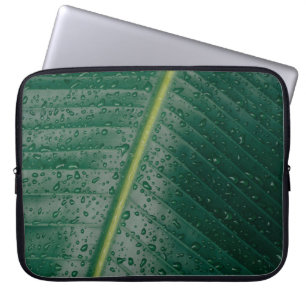 Water droplets on banana leaf laptop sleeve