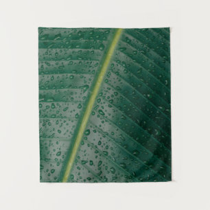Water droplets on banana leaf tapestry