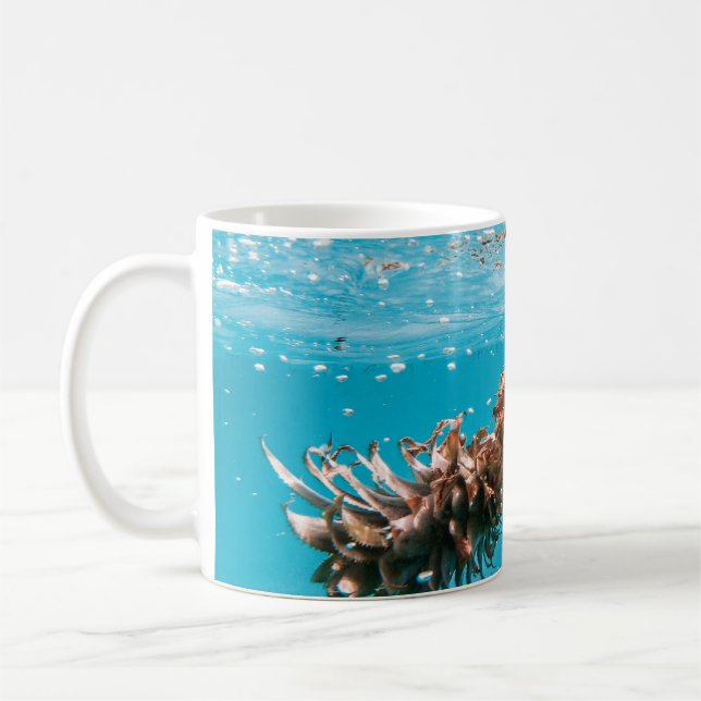 Water droplets on brown plant coffee mug (Left)