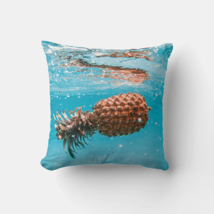 Water droplets on brown plant cushion