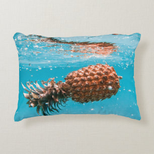 Water droplets on brown plant decorative cushion