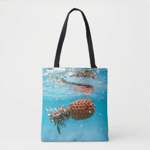 Water droplets on brown plant tote bag