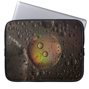 Water droplets on glass panel laptop sleeve