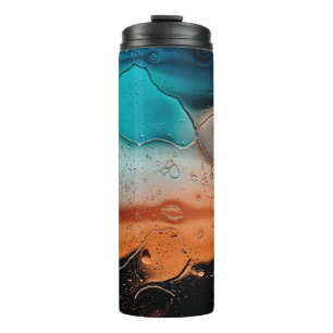 Water droplets on glass panel thermal tumbler