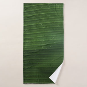 Water droplets on green leaf bath towel