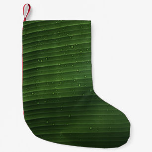 Water droplets on green leaf small christmas stocking