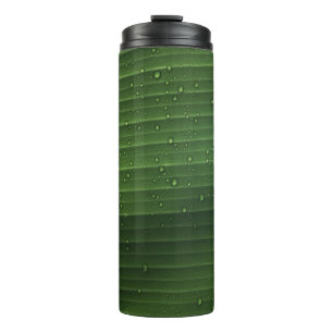 Water droplets on green leaf thermal tumbler