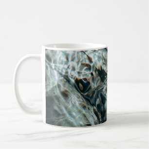 Water drops on body of water coffee mug