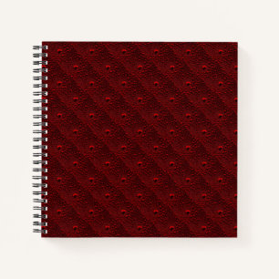 Water Drops on Crimson Metal Notebook