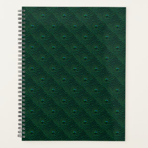 Water Drops on Green Metal Planner