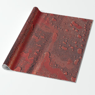 Water drops on red hood wrapping paper