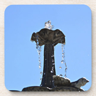 Water fountain up to the sky with water droplets  coaster
