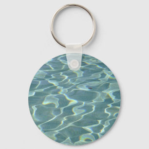 water in a swimming pool key ring