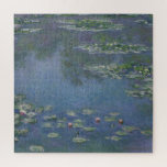 Water Lilies Monet 1906 Jigsaw Puzzle<br><div class="desc">"Water Lilies" (1906) by Claude Monet is part of the artist’s celebrated series dedicated to his water garden in Giverny. In this work, the pond’s surface shimmers with green, blue, and violet tones, dotted with delicate blossoms floating gently across the water. Monet’s impressionistic brushstrokes transform a simple scene into a...</div>