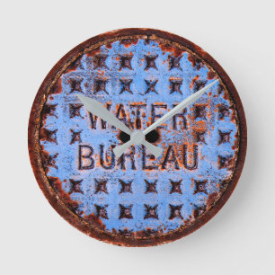 Water Manhole Cover. Rustic. California Round Clock