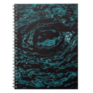 Water splash in close up photography notebook