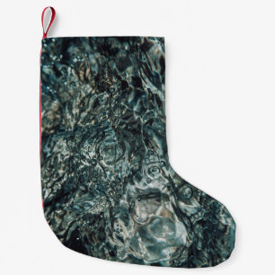 Water splash in close up photography small christmas stocking