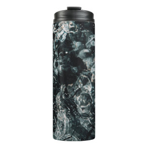 Water splash on body of water thermal tumbler