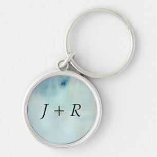 watercolor background in pastel blue and yellow key ring