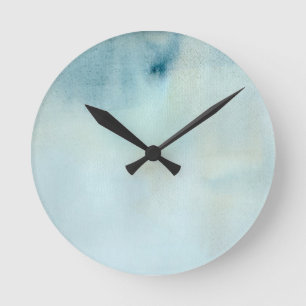 watercolor background in pastel blue and yellow round clock