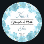 Watercolor Blue Floral Wreath Wedding Thank You Classic Round Sticker<br><div class="desc">Elegant watercolor blue floral wreath frame with a lovely Thank You script.
Gentle blue flowers watercolor art perfect to say Thank you for your special day.
Easy to personalise by changing the names and the date.</div>