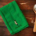 Watercolor botanical green initial monogram tea towel<br><div class="desc">A charming green kitchen towel, crafted from absorbent watercolor fabric, is personalized with an initial monogram and full name. The letter of the monogram is beautifully adorned with delicate red and white watercolor flowers, adding a touch of elegance and personalization. This decorative yet functional towel brings a personalized aesthetic to...</div>
