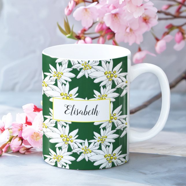Watercolor Edelweiss Hand-Illustrated Personalised Coffee Mug (This Edelweiss floral mug features white wildflowers on a forest green as well as script typography.)
