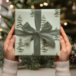Watercolor Evergreen Trees  Wrapping Paper<br><div class="desc">Wrap your gifts in serene, natural beauty with this Elegant Watercolor Pine Tree Wrapping Paper. This design features delicate hand-painted watercolor evergreen trees on a soft sage green background, creating a tranquil winter forest feel. Perfect for Christmas, winter weddings, or cosy seasonal celebrations, it blends Scandinavian minimalism with artistic watercolor...</div>