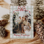 Watercolor Gingham Family Photo Christmas Holiday Card<br><div class="desc">Celebrate the season with this cosy and cheerful Christmas card featuring a hand-drawn red bow and soft sage green plaid background. The arched photo on the front is wrapped in whimsical charm, while the back includes a watercolor greenery frame with space for four photos and a heartfelt holiday message. A...</div>