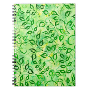 Watercolor green leaves on a yellow-green backgrou notebook
