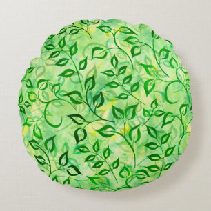 Watercolor green leaves on a yellow-green backgrou round cushion