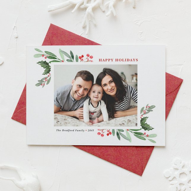 Watercolor Holly Greenery Photo Happy Holidays Holiday Card (Customizable photo holiday card featuring watercolor red winterberry and greenery)