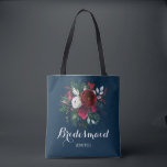 Watercolor navy red bouquet wedding bridesmaid tote bag<br><div class="desc">Rustic elegant winter / Christmas wedding stylish bridesmaid / maid of honour / flower girl tote bag featuring a bunch of red burgundy and white peony flowers with seasonal pine green fir branches, red berries and foliage on dark navy blue background. Personalise it with bridesmaid's name on front and with...</div>