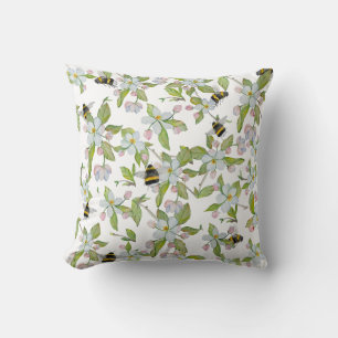 Watercolor pattern garden blooms and bumblebees cushion