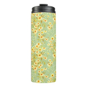 Watercolor picture of daisy flowers on a light gre thermal tumbler
