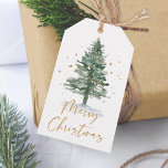 Watercolor Pine Christmas Tree Gold Gift Tags<br><div class="desc">This holiday gift tag features a watercolor pine Christmas tree accented with tiny gold stars,  and gold script Merry Christmas.</div>