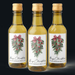 Watercolor Pines Calligraphy Ink Christmas Mini Wine Label<br><div class="desc">Modern Elegant Calligraphy Ink Script Watercolor Pines Winter Greenery with Burgundy Red Ribbon Bow Christmas Ornaments,  Pine Cones and Holly Berries Merry Christmas Mini Wine Bottle Label</div>