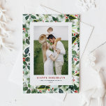 Watercolor Winterberry and Variegated Leaves Photo Holiday Card<br><div class="desc">Send warm holiday wishes with this watercolor winterberry Christmas card featuring variegated leaves. A delicate botanical pattern surrounds your photo, creating a festive and elegant look. Add your photo, names, and greeting to make each card unique. This design pairs classic red berries and soft green foliage for a timeless feel....</div>