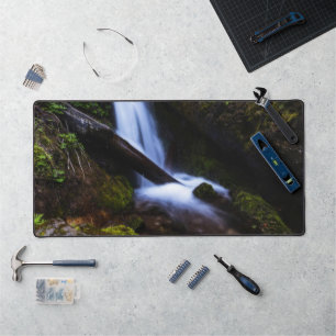 Waterfall in enchanted forest desk mat