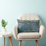 Waterlilies by Claude Monet, Vintage Flowers Lumbar Cushion<br><div class="desc">Waterlilies (1916) by Claude Monet. Water Lilies is a vintage impressionism fine art floral painting. Monet's spring season flower garden in Giverny, France. This landscape is one of many variations of water lily paintings that Monet painted by his pond. About the artist: Claude Monet (1840-1926) was a founder of the...</div>