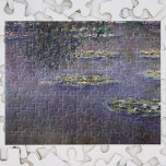 Waterlilies by Claude Monet, Vintage Impressionism Jigsaw Puzzle<br><div class="desc">Waterlilies by Claude Monet is a vintage impressionism fine art nature painting featuring waterlilies in a pond in Monet's garden at his home in Giverny, France. A tree hangs over the pond while the sky is reflecting in the water. A series of over 250 waterlily flower paintings that Monet painted...</div>