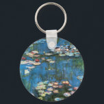 Waterlilies by Claude Monet, Vintage Impressionism Key Ring<br><div class="desc">Waterlilies (1914) by Claude Monet is a vintage impressionist fine art nature painting. One of many variations of water lily floral paintings that Monet painted by the pond in his flower garden in Giverny, France. About the artist: Claude Monet (1840-1926) was a founder of the French impressionist painting movement with...</div>
