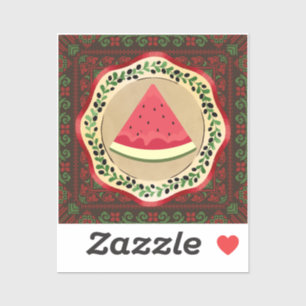 watermelon on olive plate with Palestinian tatreez
