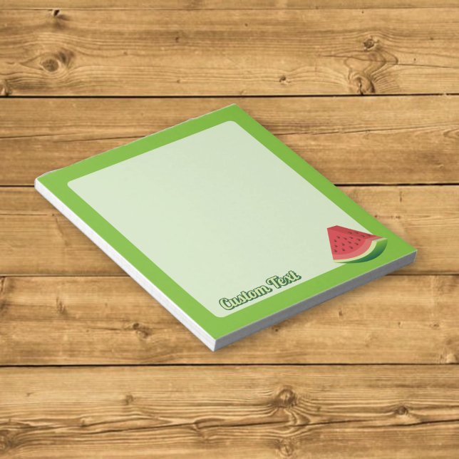 Watermelon slice on light green background notepad (Creator Uploaded)