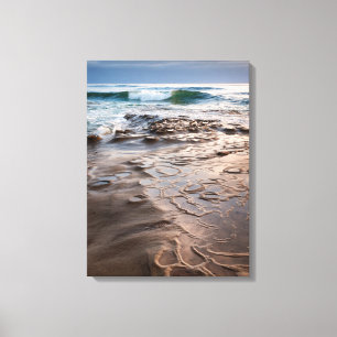 Wave breaking on beach, California Canvas Print