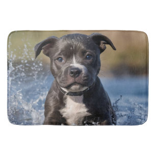 "Wave Chaser: A Staffy Puppy at Play in the Ocean" Bath Mat