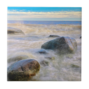 Waves crashing on shoreline rocks ceramic tile