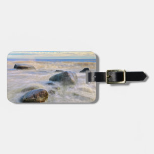 Waves crashing on shoreline rocks luggage tag
