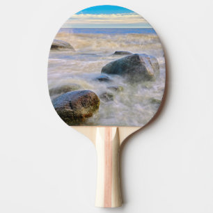 Waves crashing on shoreline rocks ping pong paddle