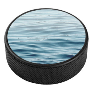 Waving water hockey puck